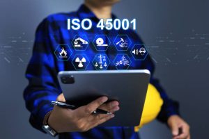 iso 45001 concept is workplace safety standard health and safety of employee or worker with standard icons and safety symbols and staff holding helmet to encourage about safety work matter